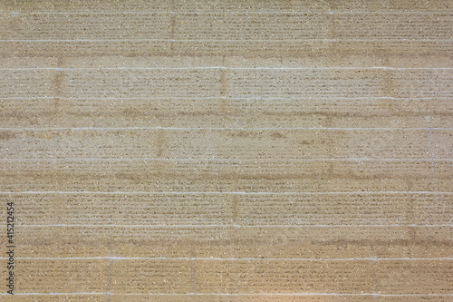 wall made of rammed earth clay elements photo