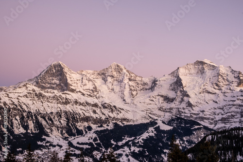 blue hour view of the bernese alps in lauterbrunnen grindelwald eiger mönch jungfrau