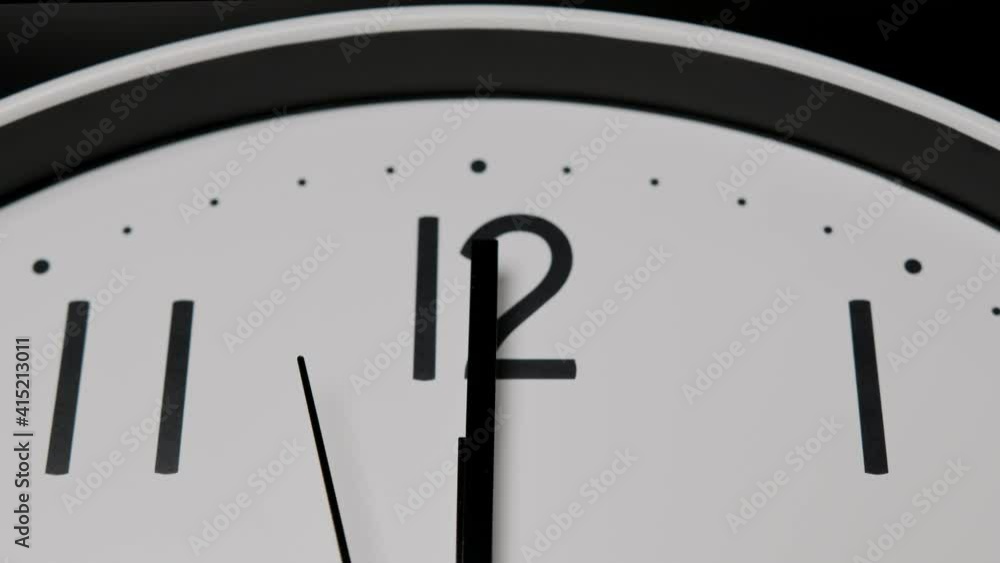 Close up Twelve o'clock, Second hand minute Walk, Time concept.
Close up Twelve o'clock, Second hand minute Walk, Time concept.