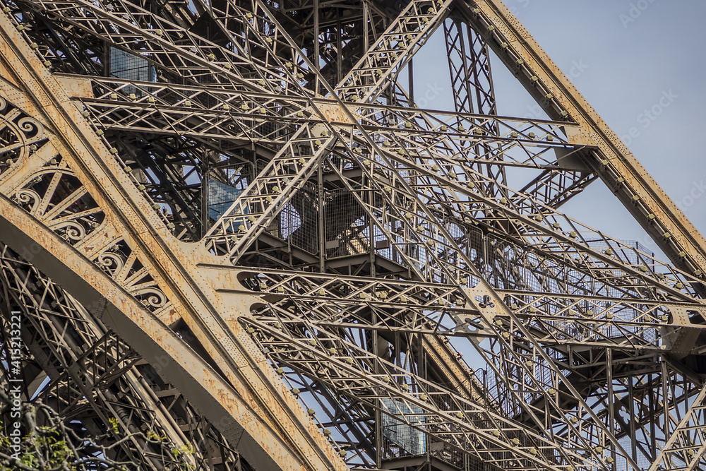 Fragments of the construction of the Eiffel tower (Eiffel Tower) on Champ de Mars in Paris. Tower is tallest structure in Paris and most visited monument in the world. France.