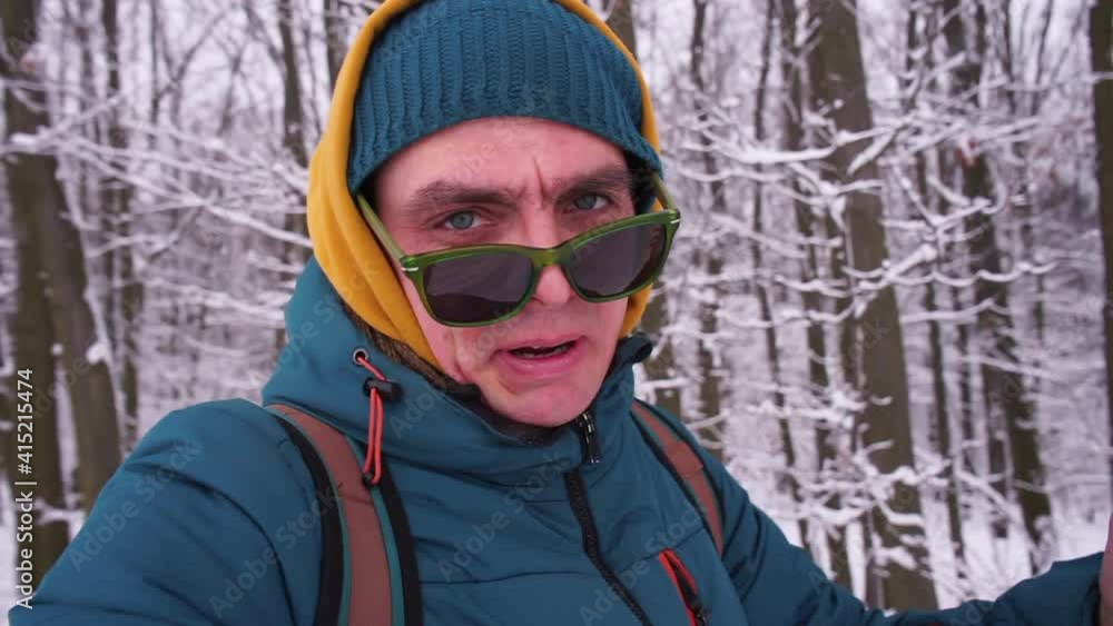 The blogger takes off his glasses and talks with subscribers. Transfer of information using video hosting. Motivation with a positive mood. Camera movements. The blogger takes off his glasses and talks with subscribers. Transfer of information using video hosting. Motivation with a positive mood. Camera movements.