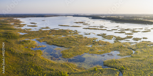 Aerial shot of beautiful Karula National Park full of lakes in Estonia photo