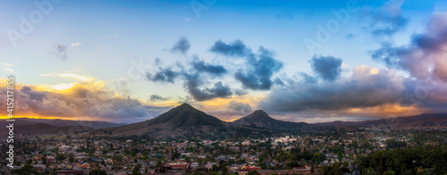 Panoramic View of Mountains, town, Peaks at Sunset