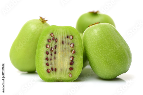 mini kiwi baby fruit (actinidia arguta) on white background  photo