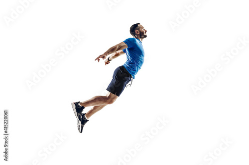 Flying. Caucasian professional male athlete, runner training isolated on white studio background. Muscular, sportive man. Concept of action, motion, youth, healthy lifestyle. Copyspace for ad.