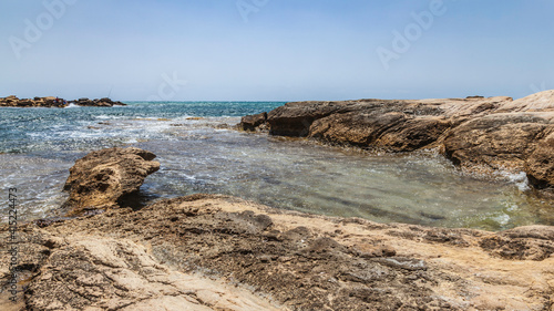 Rocks and water in a spanish beach
