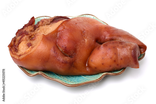 cooked the face of the pig on white background photo