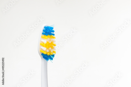 Usual toothbrush on white background