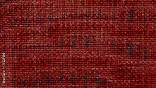 red linen texture, canvas fabric as background. close up red weaving or mesh fabric texture background. close up cotton or fabric fiber background.
