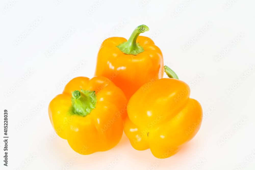 Yellow Bell pepper with leaves Yellow Bell pepper with leaves