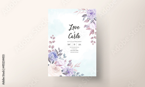 Beautiful wedding invitation card with purple flower ornament © mariadeta