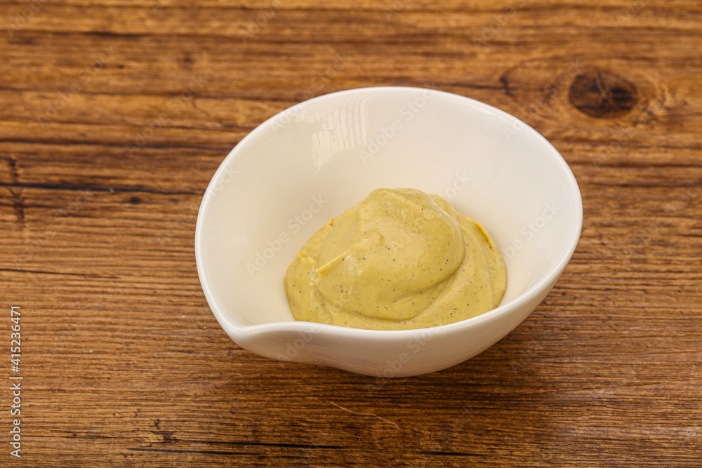 Dijon mustard sauce in the bowl Dijon mustard sauce in the bowl