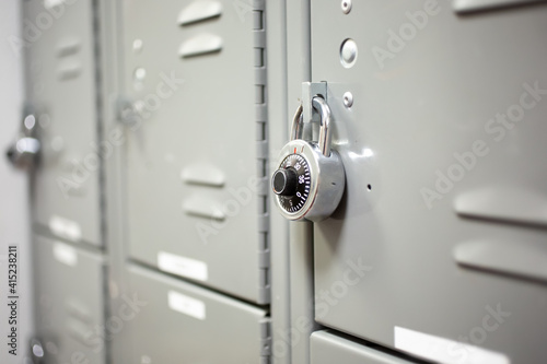 Canvas Print A view of a set of lockers, featuring a combination dial padlock.