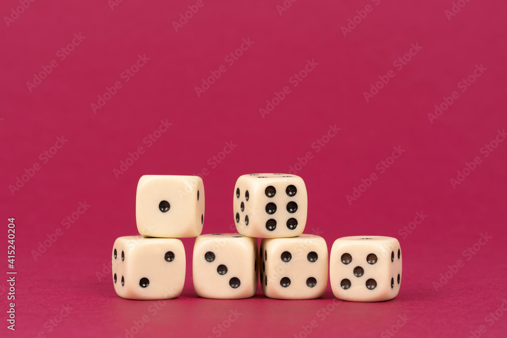 Six dice game on red background. Concept of luck and gambling game Six dice game on red background. Concept of luck and gambling game
