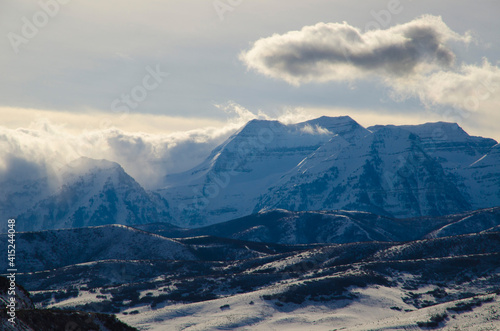 snow covered mountains winter mountains clouds and mountains 