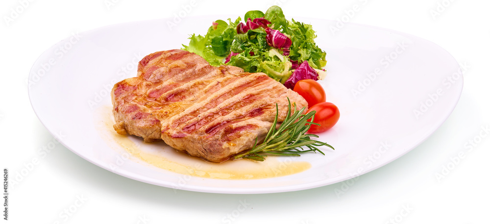 Grilled juicy pork steak with rosemary, fried meat, close-up, isolated on white background Grilled juicy pork steak with rosemary, fried meat, close-up, isolated on white background