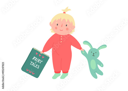 Storytime. Baby wants to read fairy-tales to her toy. Cute child in sleepsuit plays with book and rabbit.