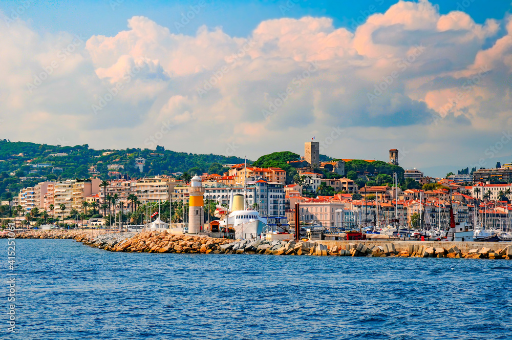 Picturesque view to old city and harbor in Cannes from the sea, French Riviera, France