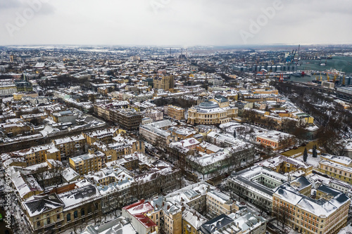 Cityscape of Odessa with cargo port on right after snow blizzard on February 8, 2021.