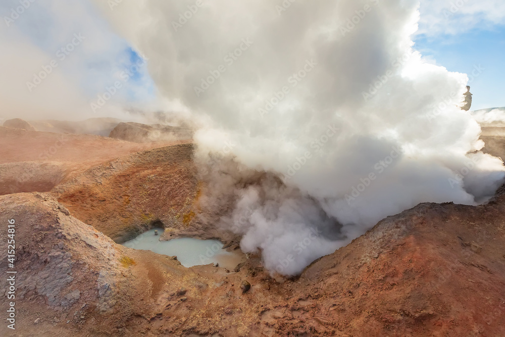 Steam pool and smoke in Sol de Manana at sunrise. Volcanic Geysers in Bolivia, South America