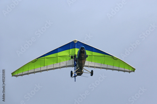 Canvas-taulu Ultralight airplane in a blue sky