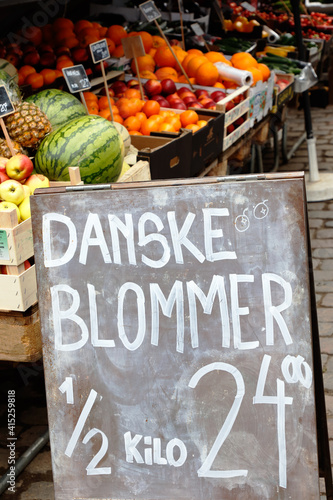 Sign with price offer for Danish plums at the market stalls. © Roland Magnusson