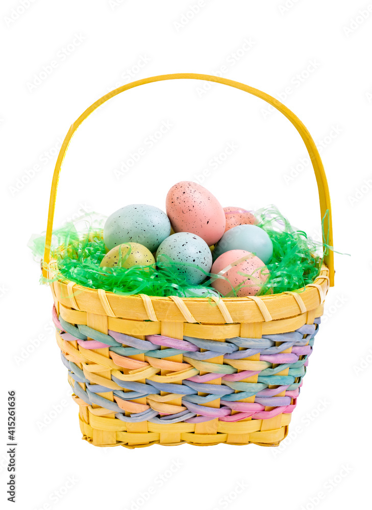 Easter eggs in a yellow wicker basket.