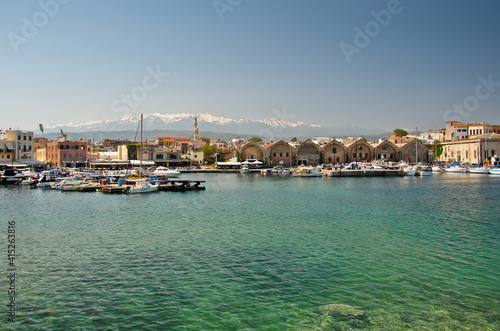 The small port of Chania on the island of Crete with mountain views. © Stas