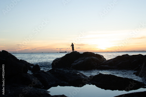 a man enjoying a sunset close the beach © Patricia Fragoso