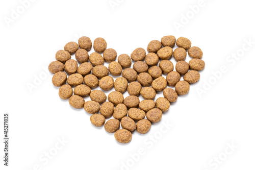 domestic animals dry food isolated on white background. dry cat feed cut out. above view. heart symbol