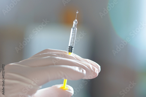 hand with syringe