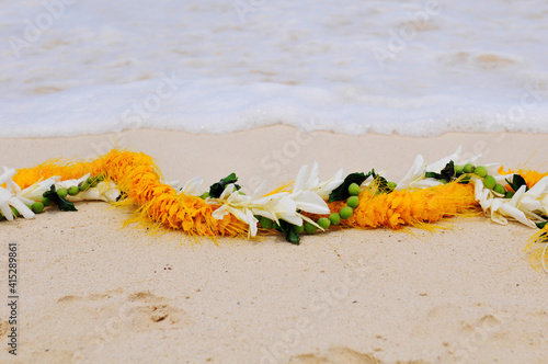 Flower Lei on Beach Hawaii photo