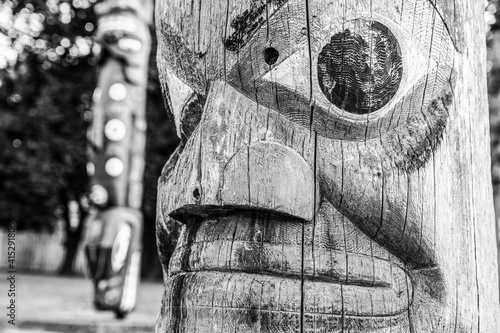 detail of Coast Salish totem pole, Victoria, BC, Canada photo