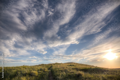 sunset over a grassland trail  Writing-on-Stone Provincial Park  Alberta