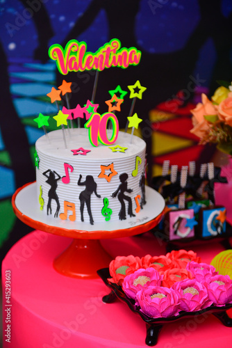 teen children's birthday decoration with vibrant neon colors, 10th birthday cake, neon cake, birthday table with pink tablecloth, pink tablecloth, cake and sweets table, #10, birthday party