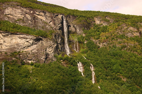 waterfall and trees in the mountains 