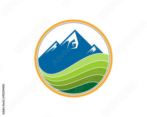 Blue mountain with green field in the circle