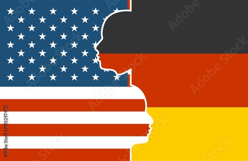 Image relative to politic and economic relationship between USA and Germany. National flags inside the heads of the businessmen. Teamwork concept.