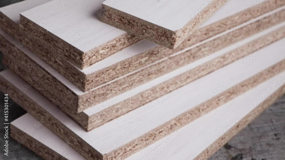 Stack of laser cut white melamine boards Stack of laser cut white melamine boards