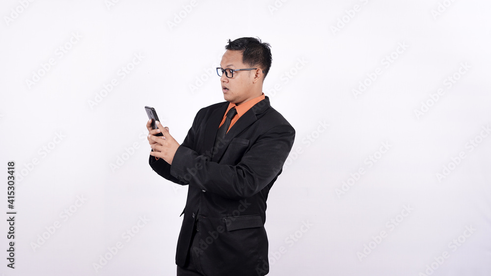 businessman wow expression see handphone white background businessman wow expression see handphone white background