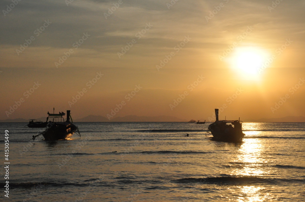fishing boats at sunset fishing boats at sunset