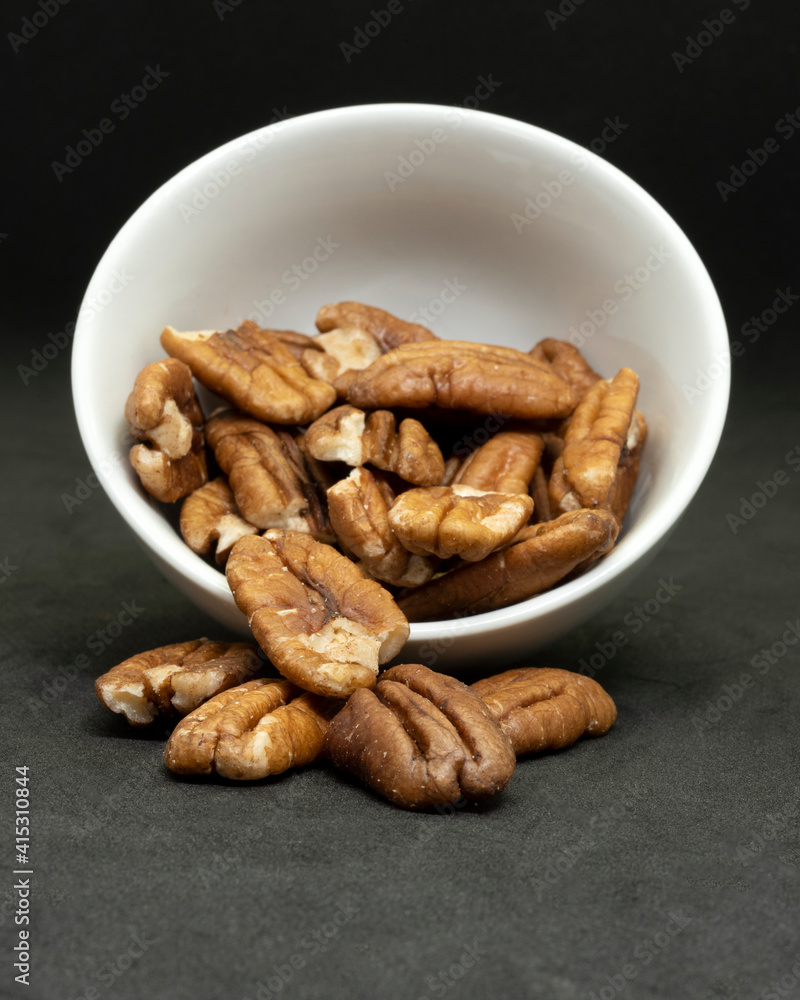 Some walnuts in a pile Some walnuts in a pile