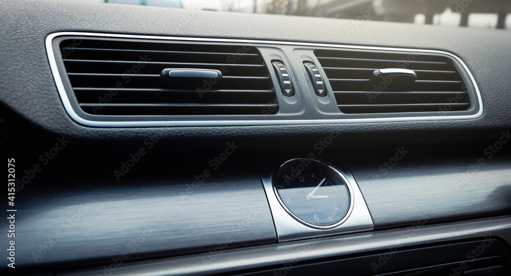 car dashboard with clock and vents car dashboard with clock and vents