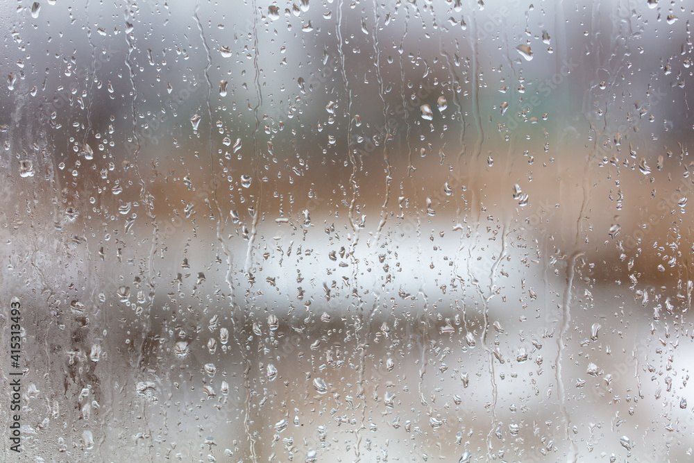 Obraz premium Raindrops on the glass window as a background.