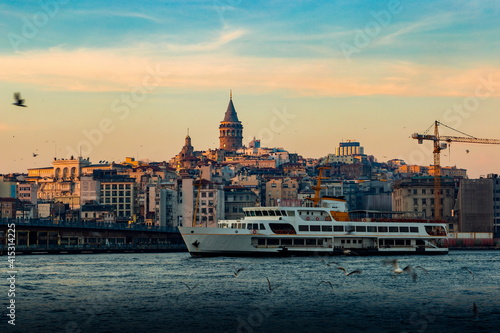 Cruise ferries in Bosphorus between european and asian coasts of Istanbul. Galata Tower in the distance. Turkey. © Sergey Fedoskin