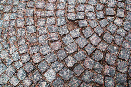 pavers road in the park. background of stones