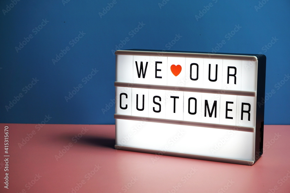 We love our customer word in light box business concept background