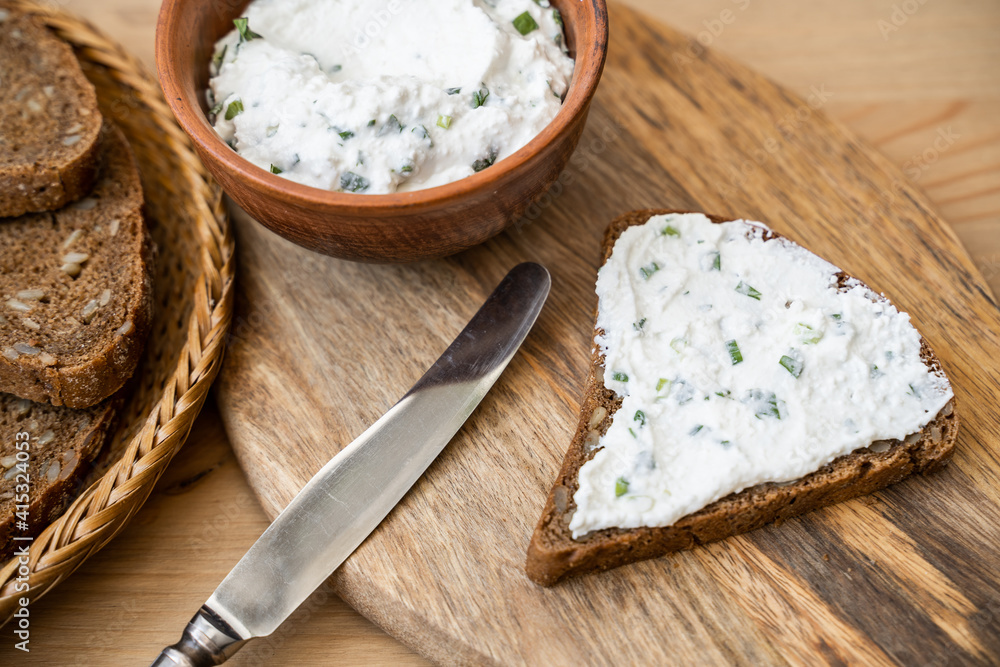 Slice of Bread with fresh made Herb Curd