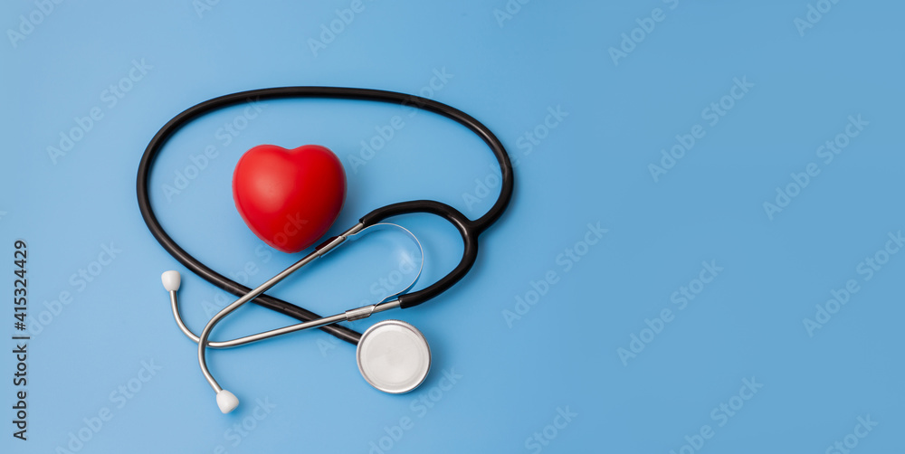 Stethoscope and red hearts on a blue background Health care concept. Stethoscope and red hearts on a blue background Health care concept.