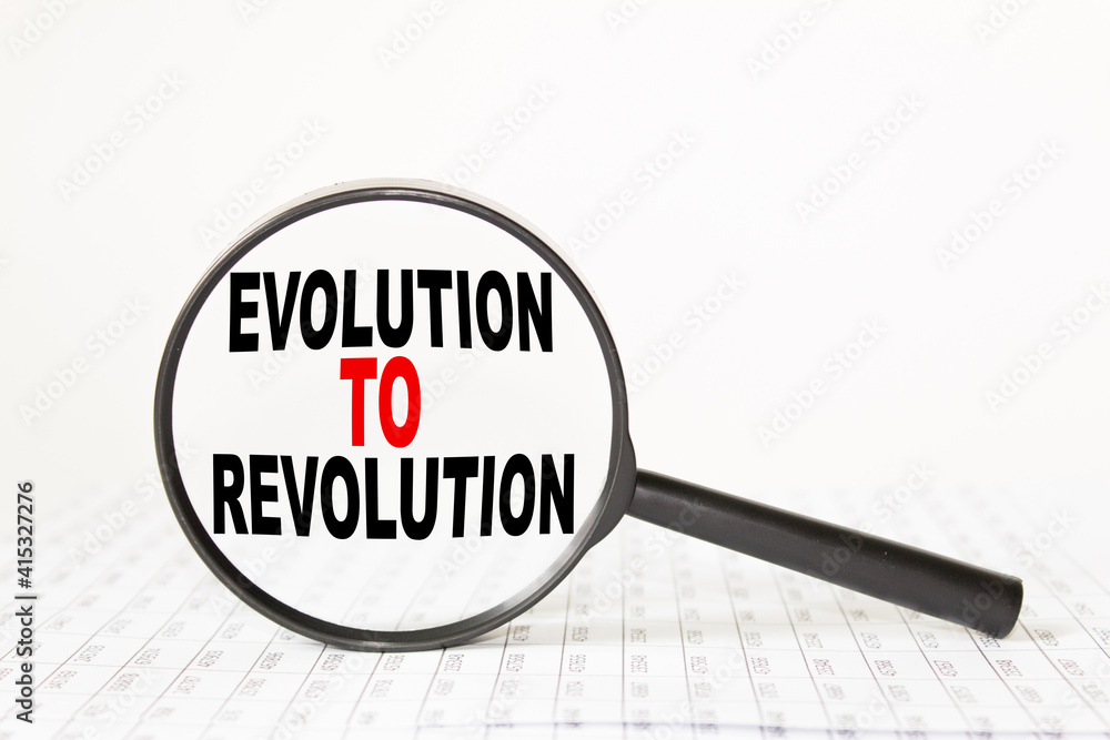 words EVOLUTION TO REVOLUTION in a magnifying glass on a white background. business concept words EVOLUTION TO REVOLUTION in a magnifying glass on a white background. business concept